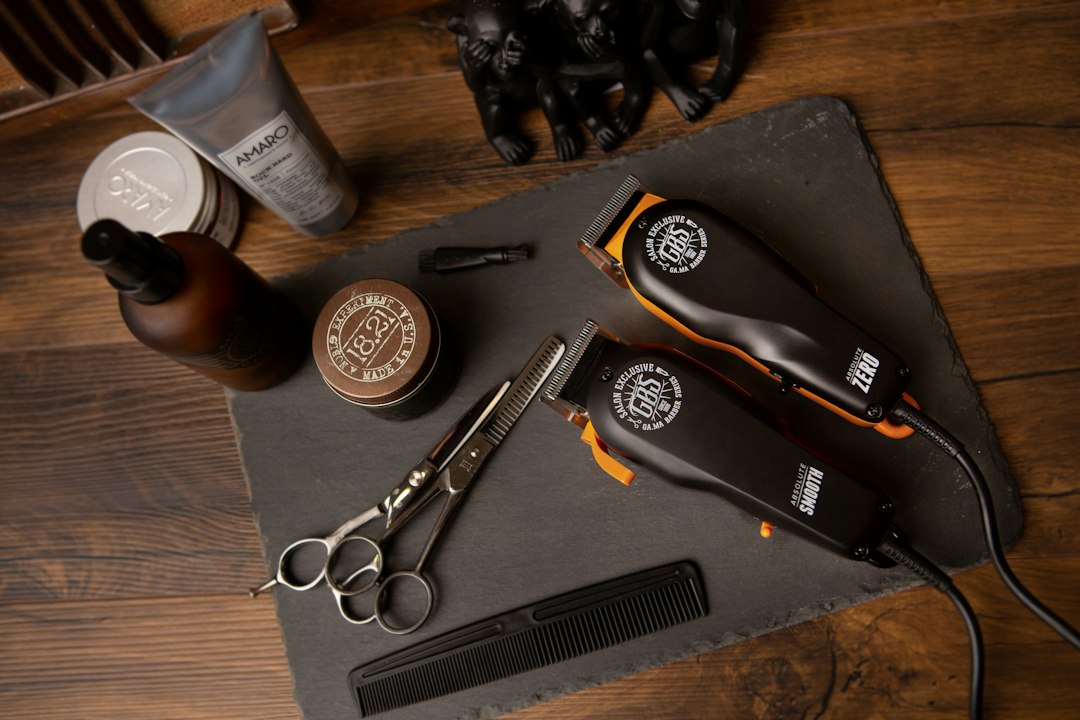 Barber tools — clippers, scissors and comb laid out