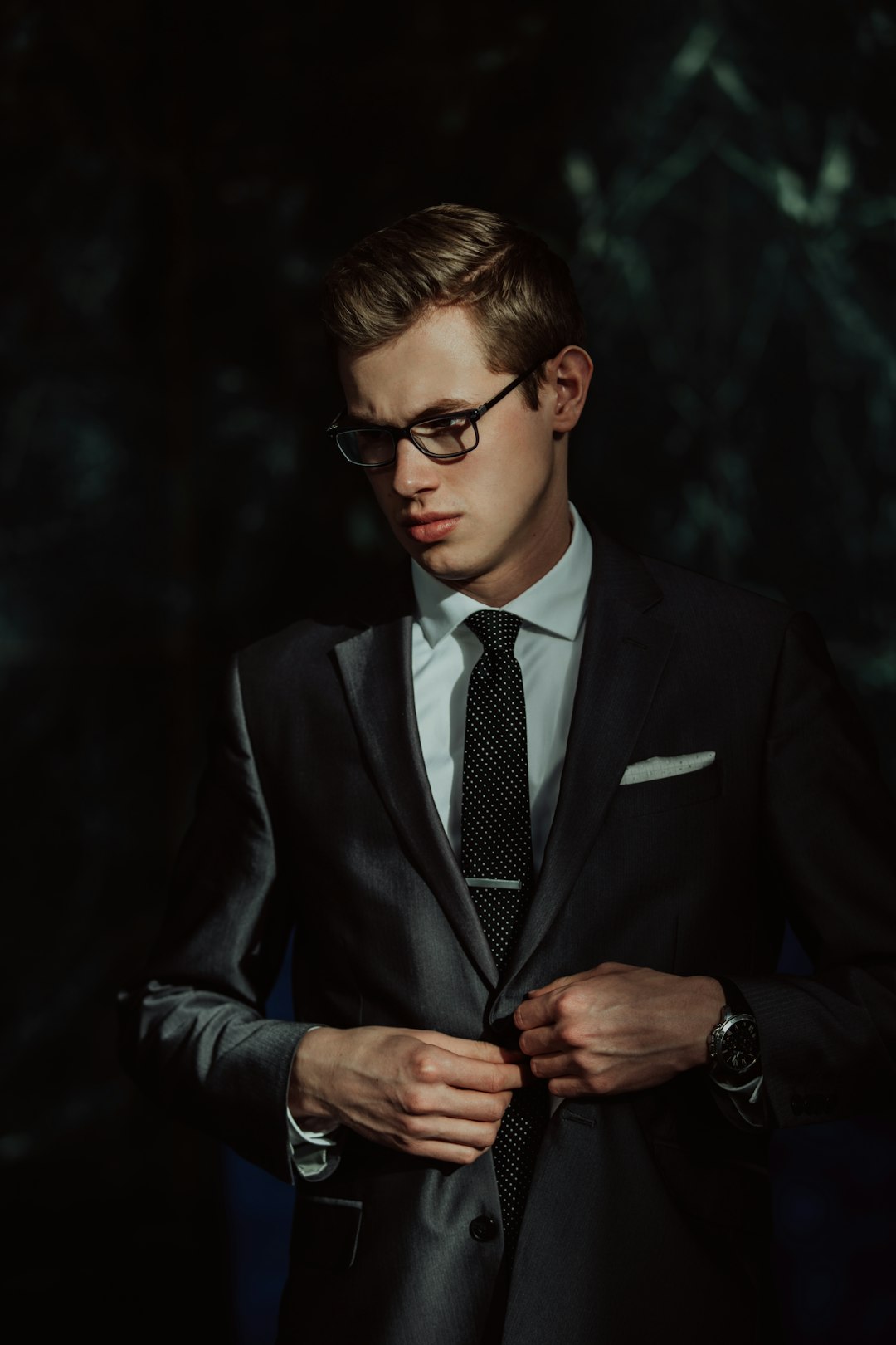 Groom in a black tuxedo, ready for the wedding day